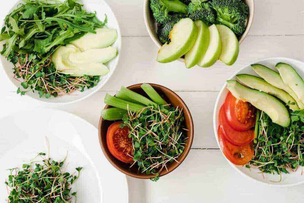 bowls of broccoli sprouts